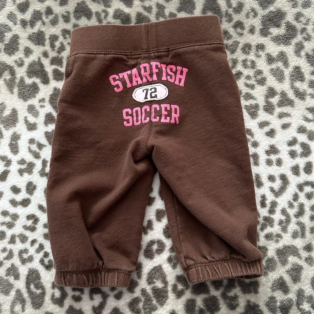Old Navy Starfish Soccer Graphic Jogger Pants in Brown Size 6-12 Months